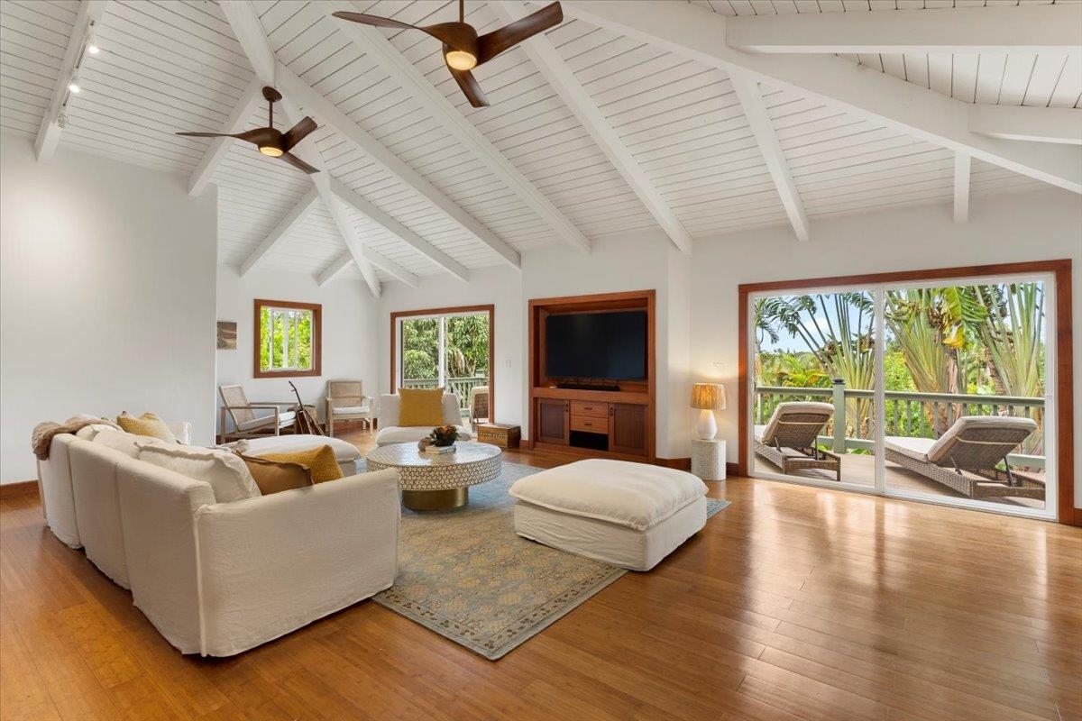 60 Koolau Road Haiku, HI 96708 - Photo 15 of 47 a living room with furniture and a large window