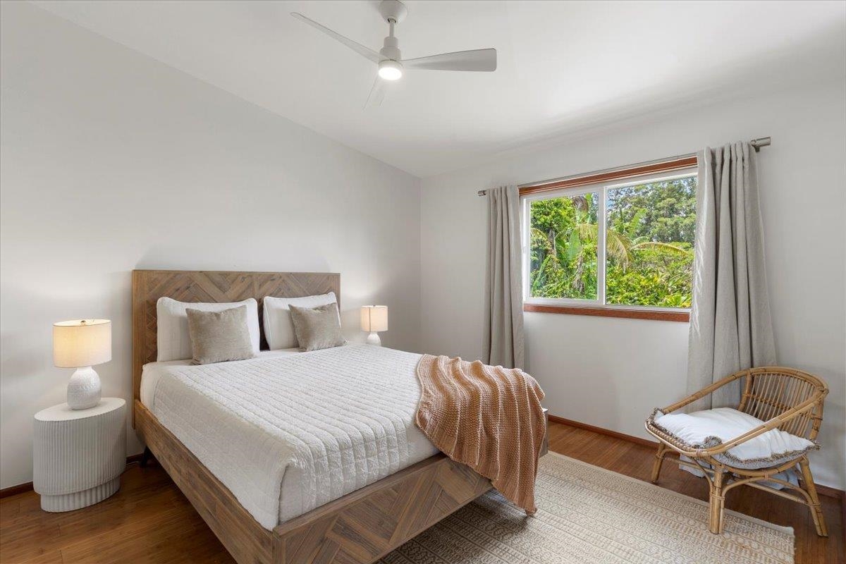 60 Koolau Road Haiku, HI 96708 - Photo 25 of 47 a bedroom with a bed and a window