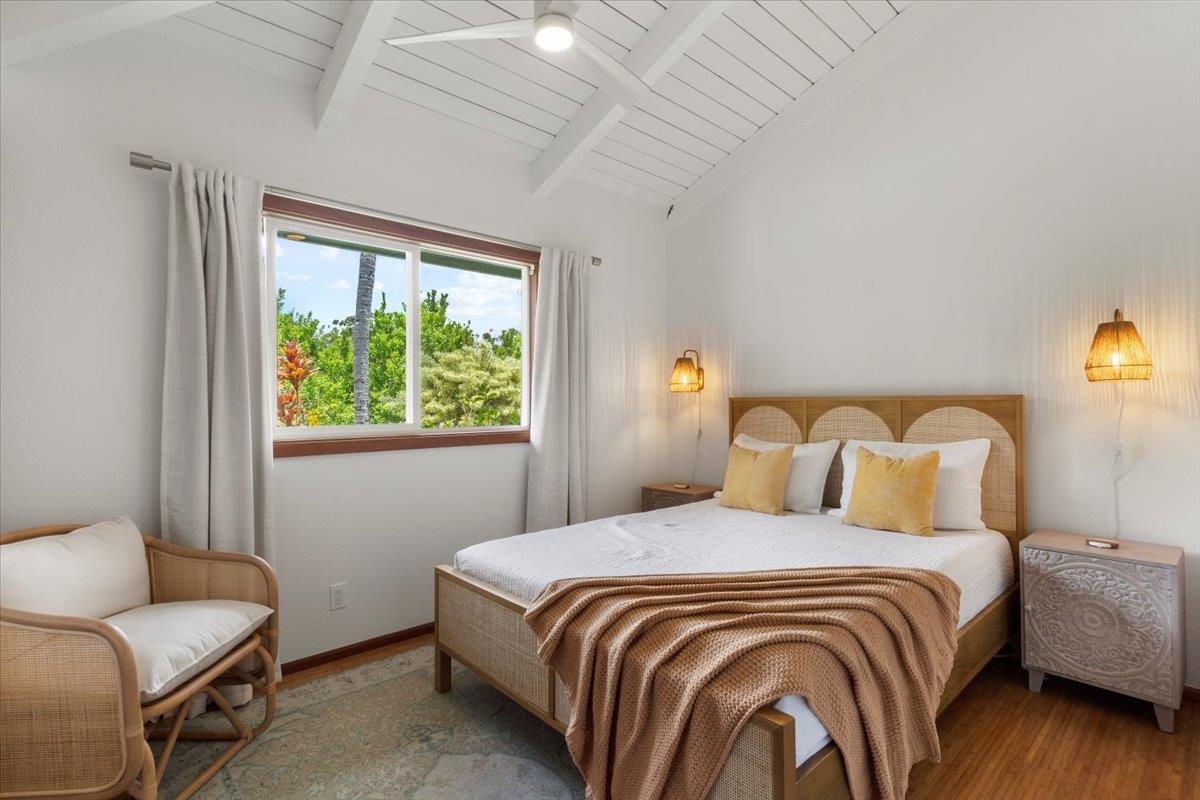 60 Koolau Road Haiku, HI 96708 - Photo 27 of 47 a bedroom with a bed and a window