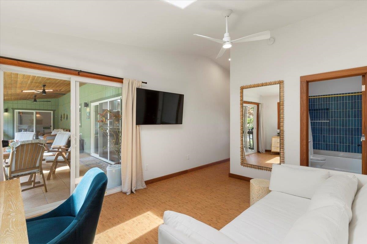60 Koolau Road Haiku, HI 96708 - Photo 28 of 47 a living room with furniture and a flat screen tv