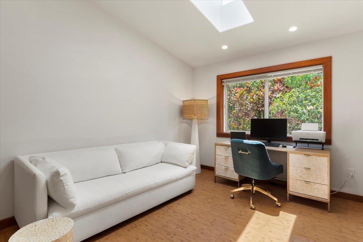 60 Koolau Road Haiku, HI 96708 - Photo 29 of 47 a living room with furniture and a flat screen tv