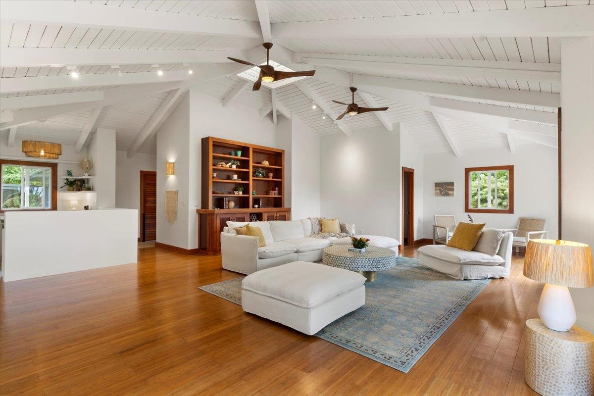 60 Koolau Road Haiku, HI 96708 - Photo 3 of 47 a living room with furniture and wooden floor