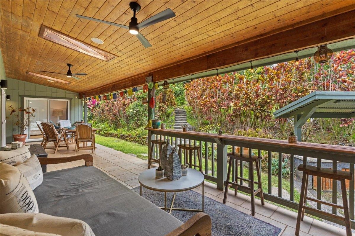60 Koolau Road Haiku, HI 96708 - Photo 32 of 47 a view of a patio with couches table and chairs