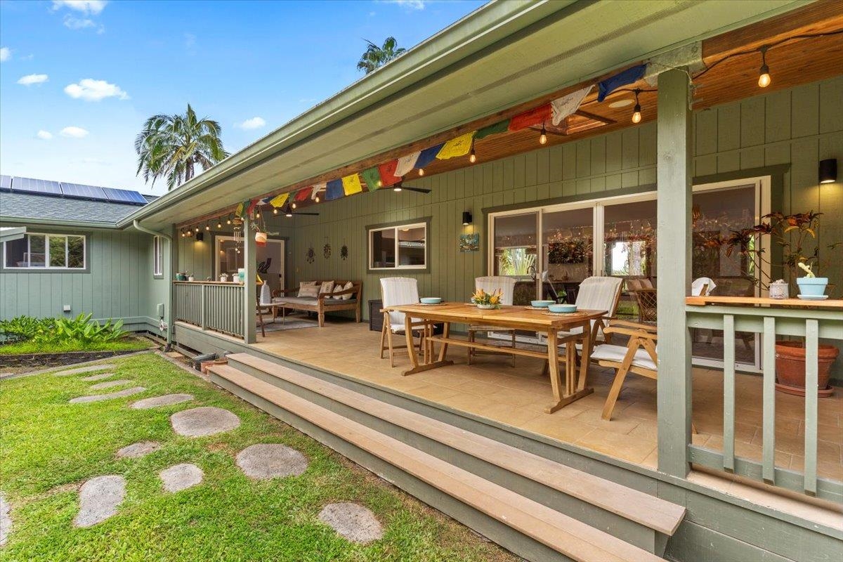 60 Koolau Road Haiku, HI 96708 - Photo 34 of 47 a backyard of a house with garden and outdoor seating