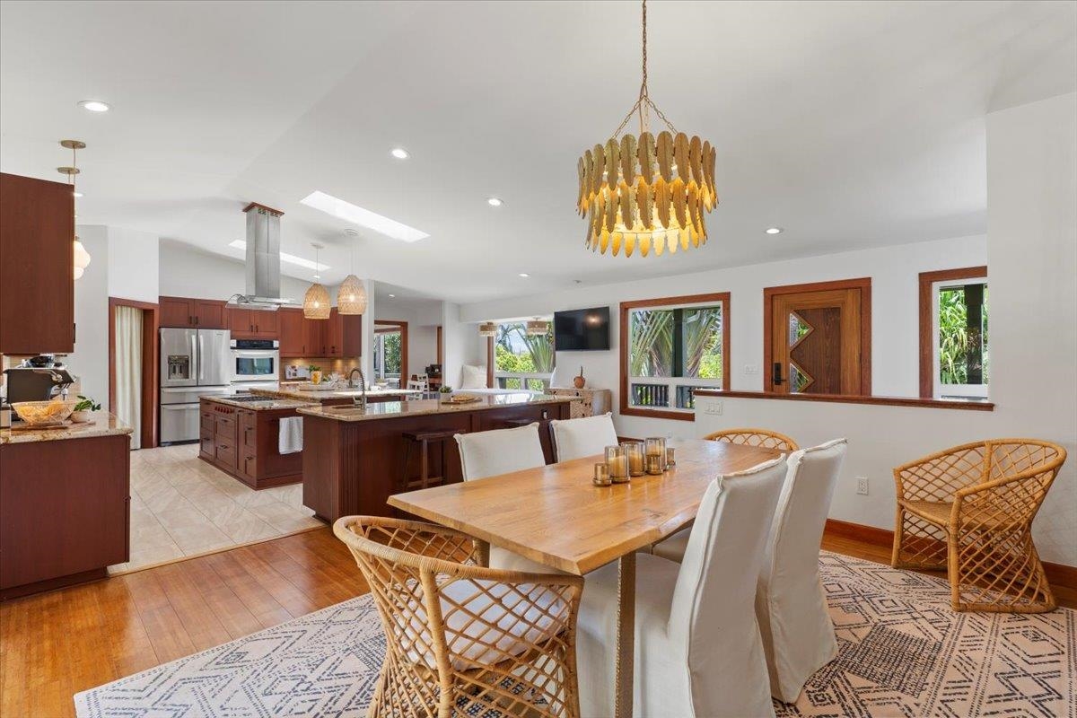 60 Koolau Road Haiku, HI 96708 - Photo 5 of 47 a dining room with furniture and wooden floor
