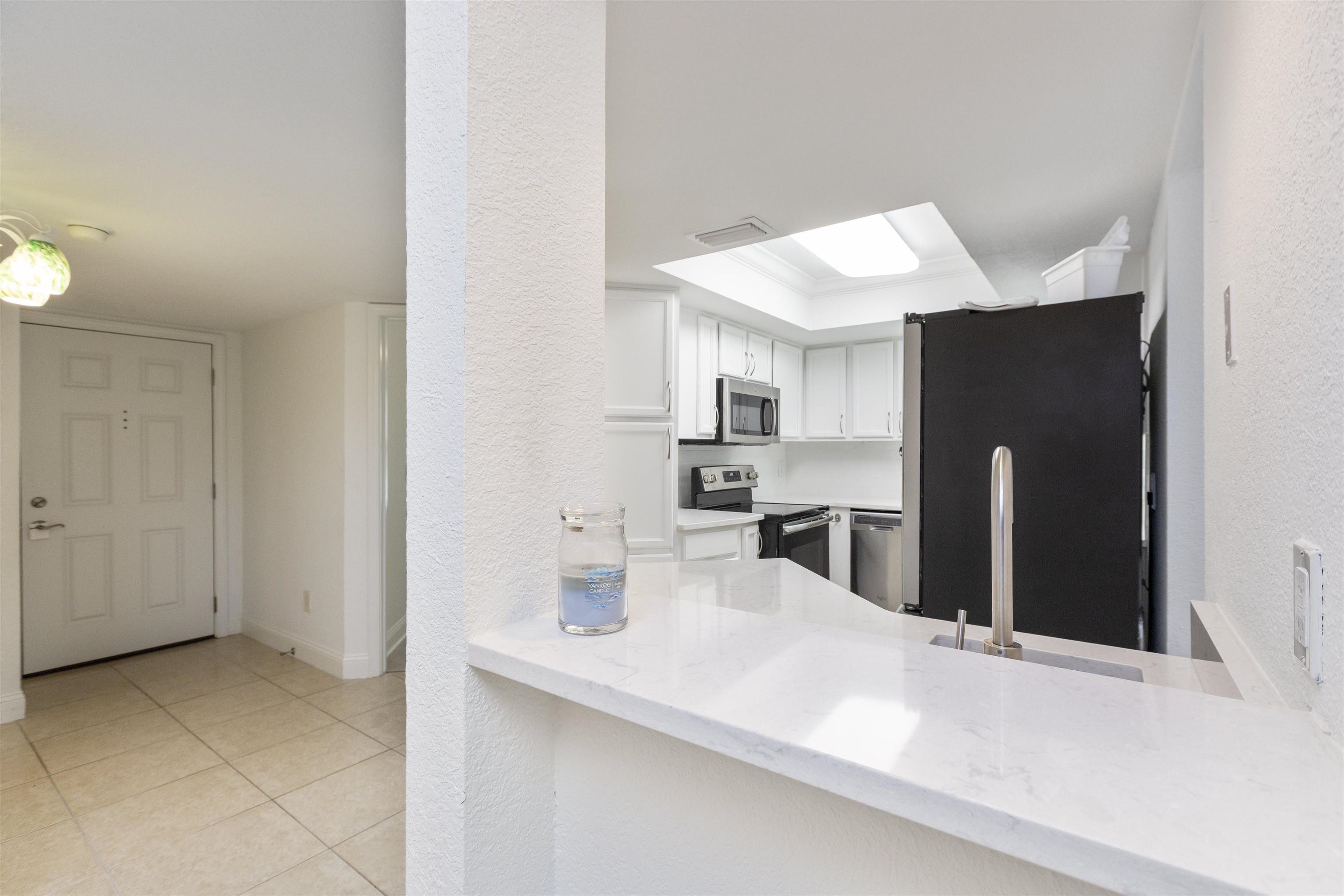 923 Seashell Lane Ponte Vedra Beach, FL 32082 - Photo 15 of 60 a kitchen with stainless steel appliances granite countertop a refrigerator and a sink