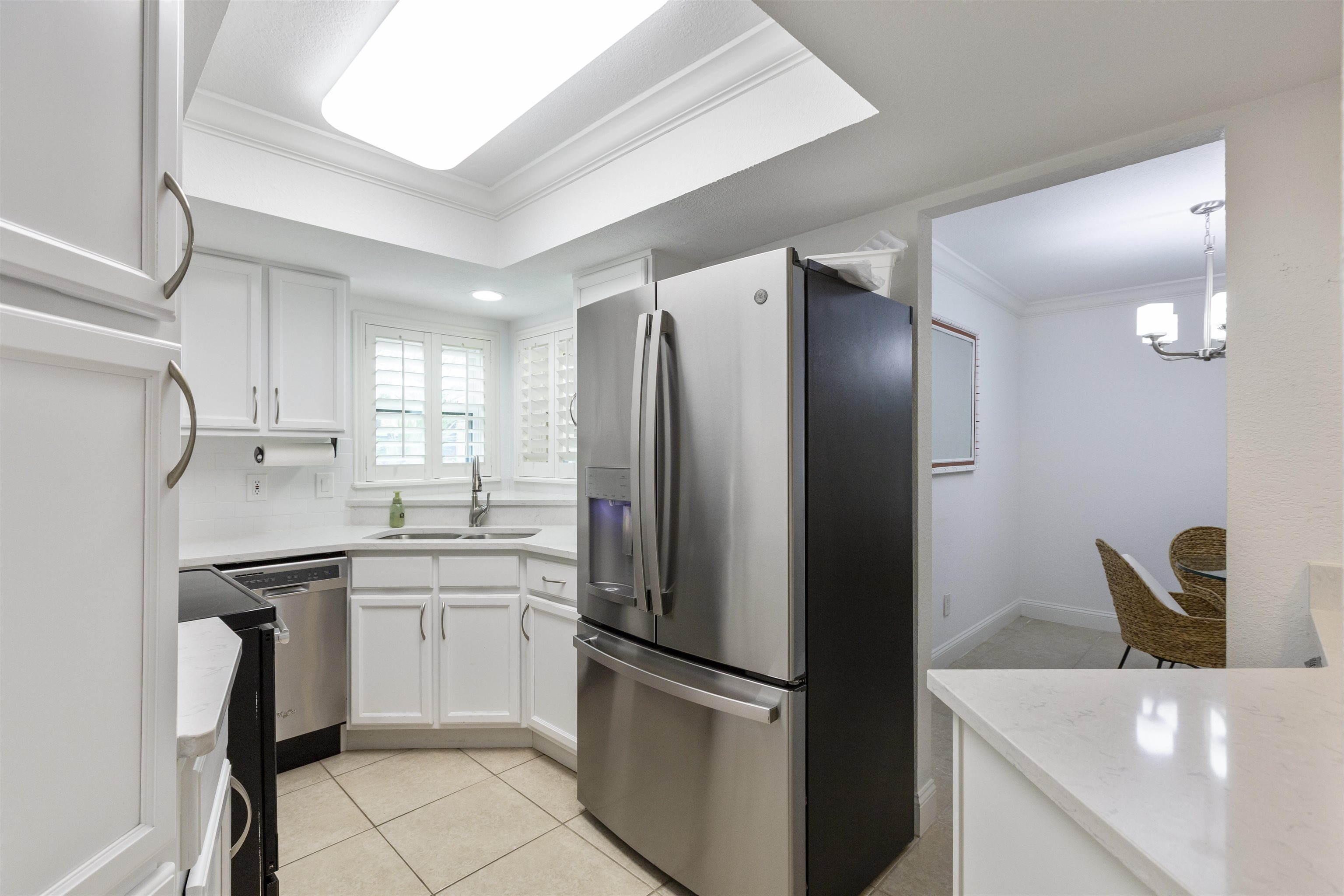 923 Seashell Lane Ponte Vedra Beach, FL 32082 - Photo 16 of 60 a kitchen with stainless steel appliances a refrigerator sink and cabinets
