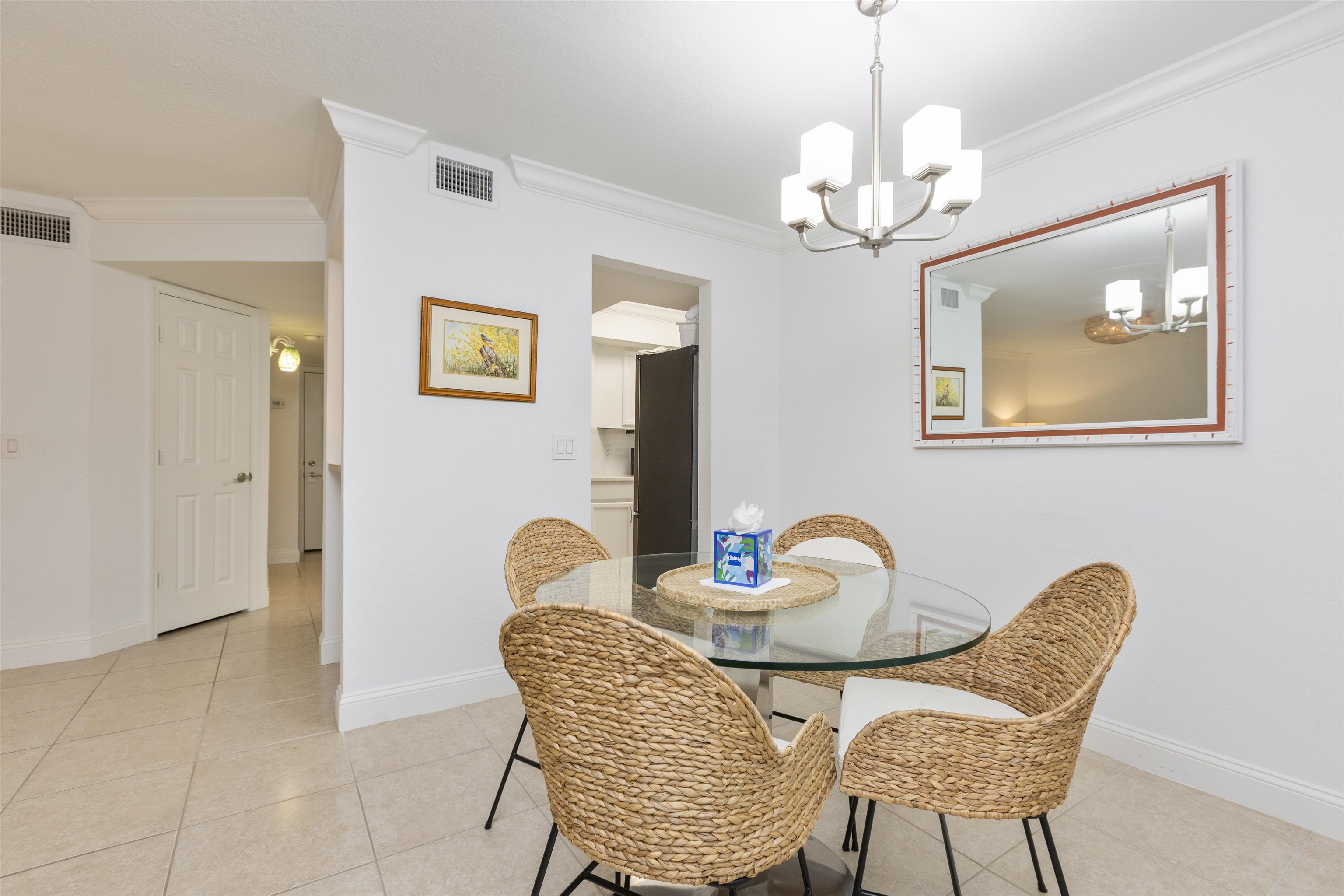 923 Seashell Lane Ponte Vedra Beach, FL 32082 - Photo 25 of 60 a dining room with furniture and chandelier