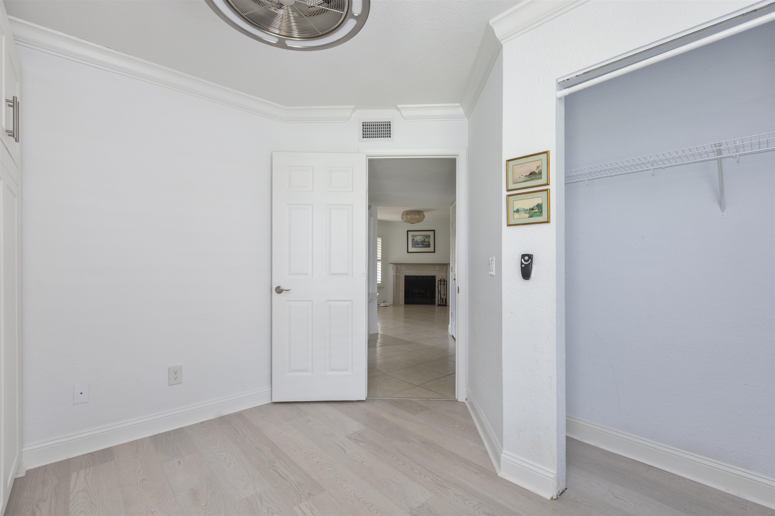 923 Seashell Lane Ponte Vedra Beach, FL 32082 - Photo 44 of 60 a view of a hallway with wooden floor and closet
