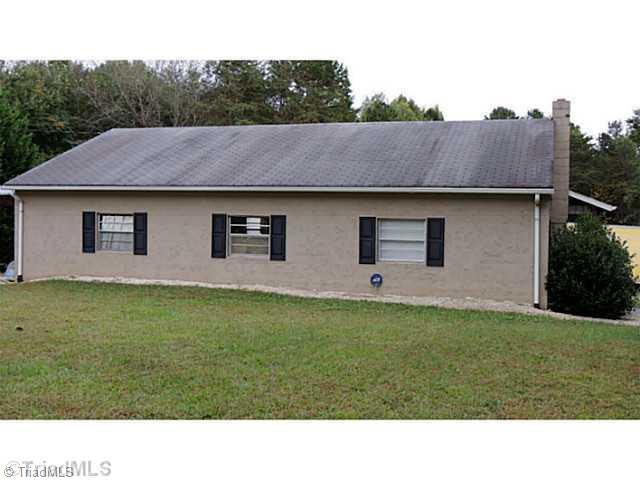7410 Styers Ferry Road Clemmons, NC 27012 - Photo 11 of 16 Workshop. Garage/ workshop near house complete with office.
