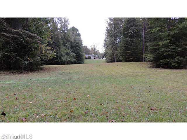 7410 Styers Ferry Road Clemmons, NC 27012 - Photo 5 of 16 Land. View from back of meadow up towards home.