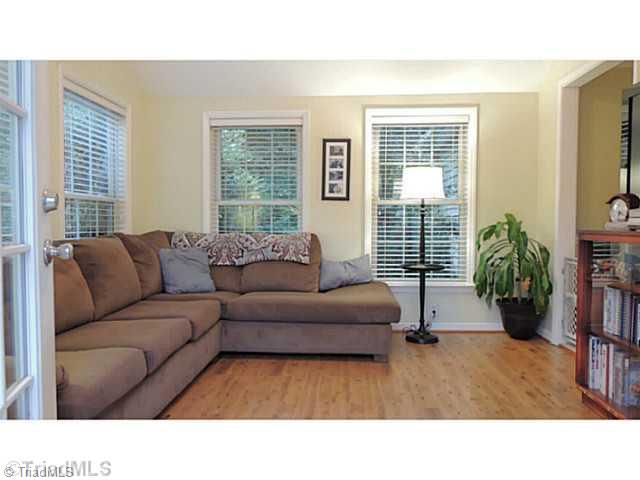 7410 Styers Ferry Road Clemmons, NC 27012 - Photo 10 of 16 Den/Family/Great Room. Sunroom off kitchen has beautiful view of rolling meadow. Ideal for den or playroom.