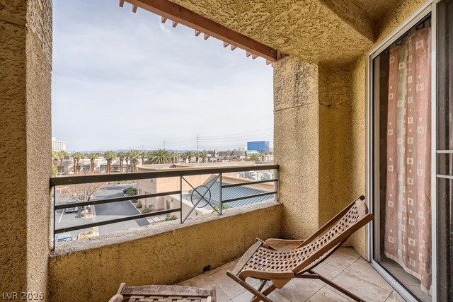 270 East Flamingo Road, Unit 315 Las Vegas, NV 89169 - Photo 11 of 11 An inviting private balcony, perfect for savoring refreshing breezes and a wide neighborhood vista.