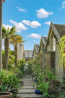 a view of a yard with an outdoor seating