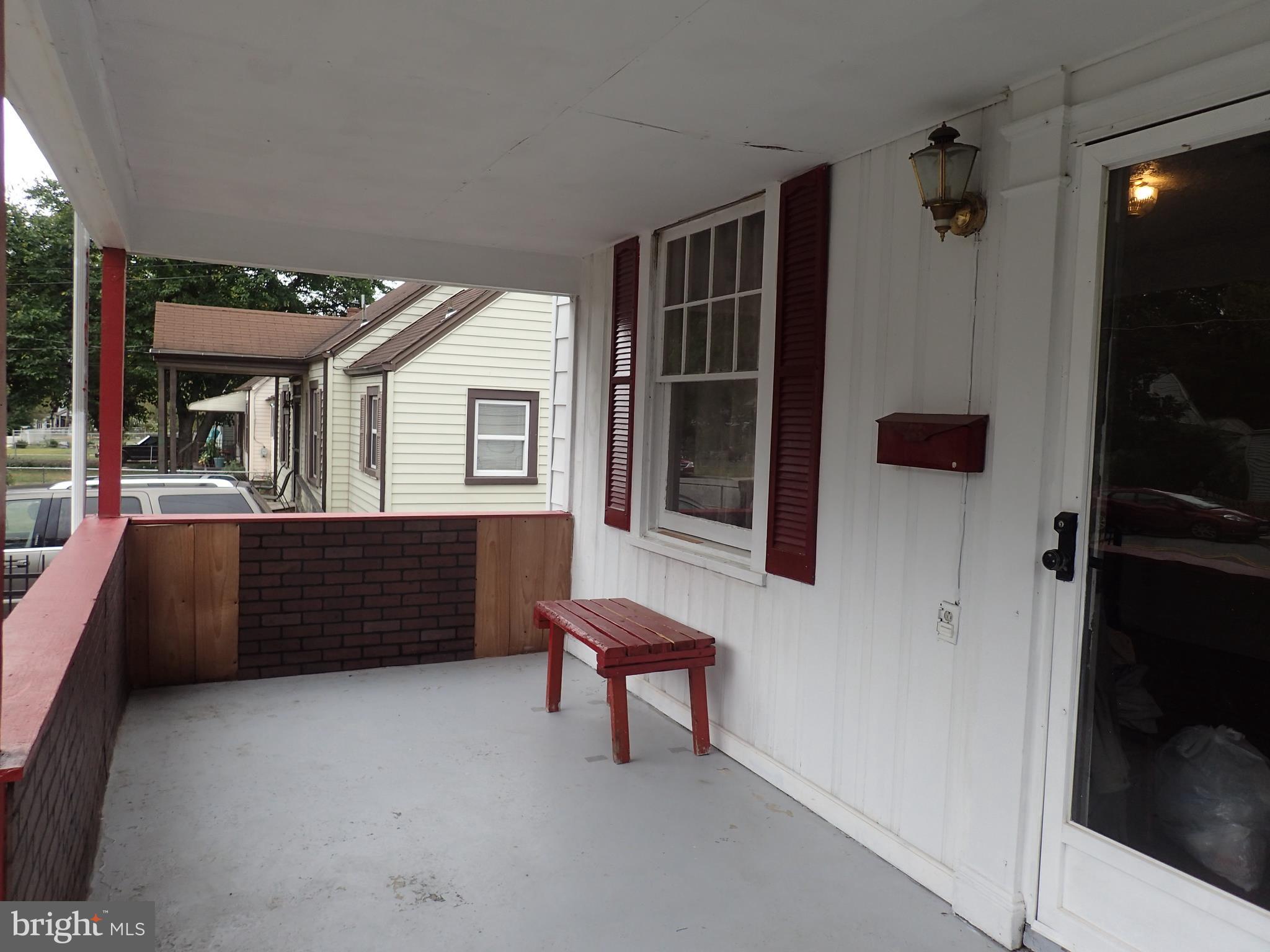 6715 Larkspur Road Morningside, MD 20746 - Photo 14 of 29 Covered Front Porch