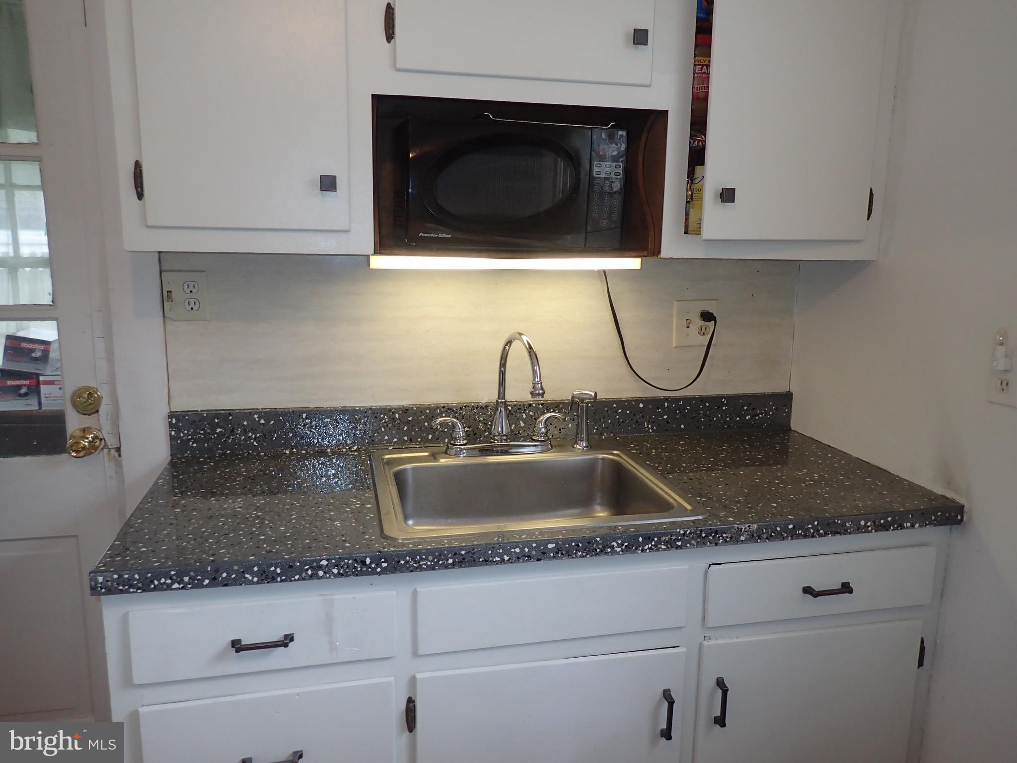 6715 Larkspur Road Morningside, MD 20746 - Photo 22 of 29 Kitchen - new countertops and sink