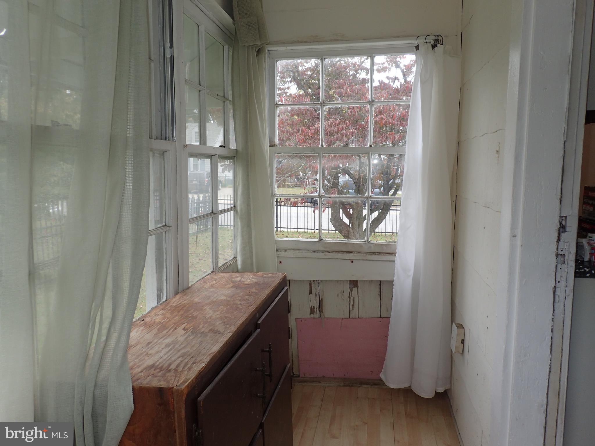 6715 Larkspur Road Morningside, MD 20746 - Photo 23 of 29 Sun Room off Kitchen
