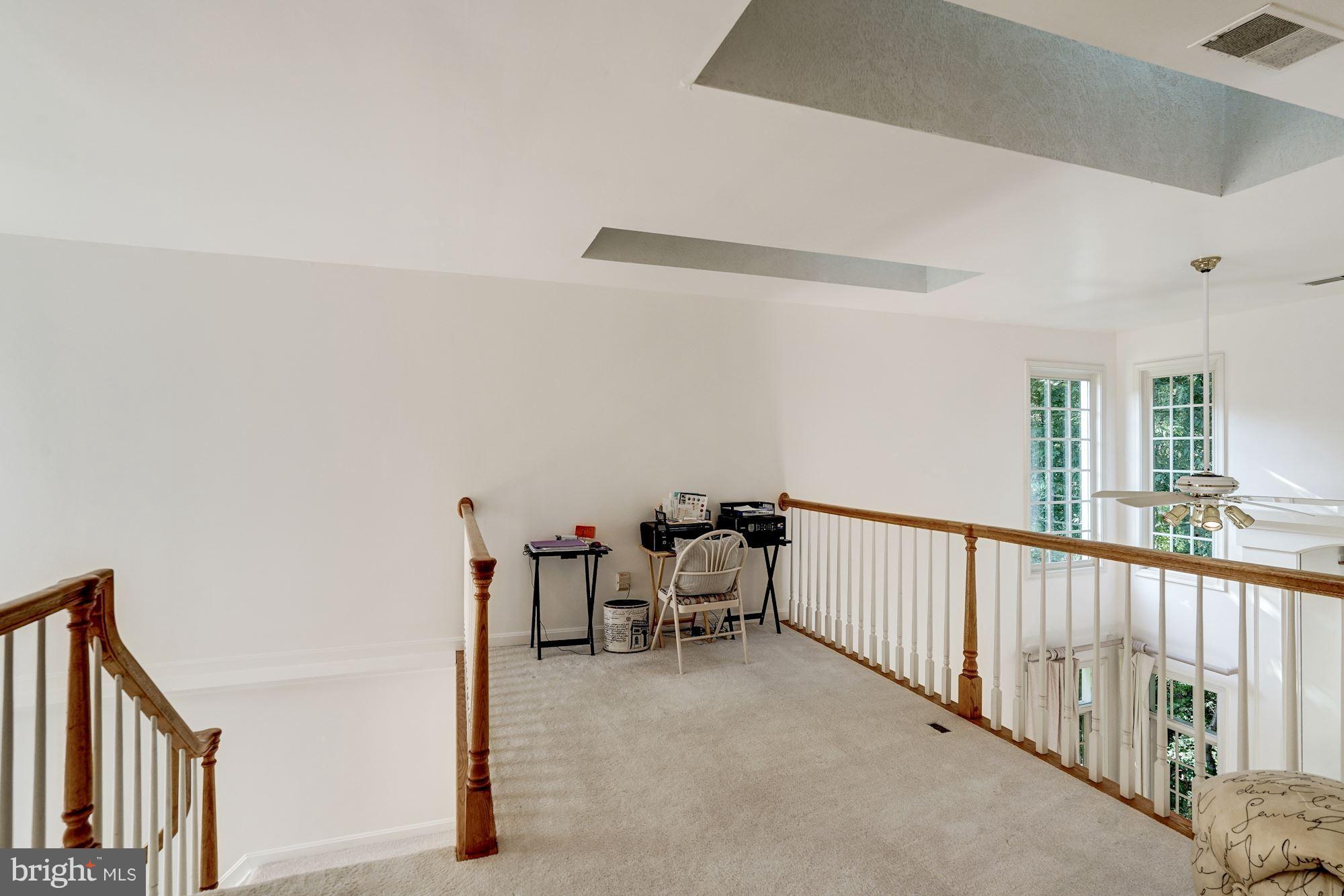 11406 Hollow Timber Way Reston, VA 20194 - Photo 13 of 30 a view of a hallway with seating area