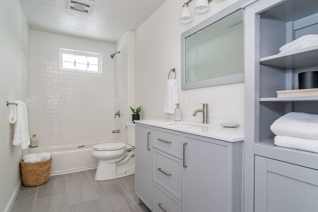 100 Oxbow Road Wayland, MA 01778 - Photo 12 of 17 a bathroom with a toilet sink and mirror