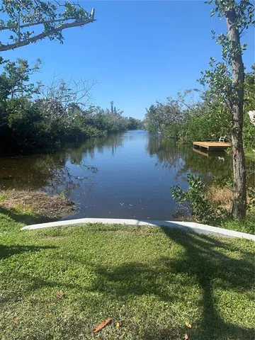 a view of a lake from a yard