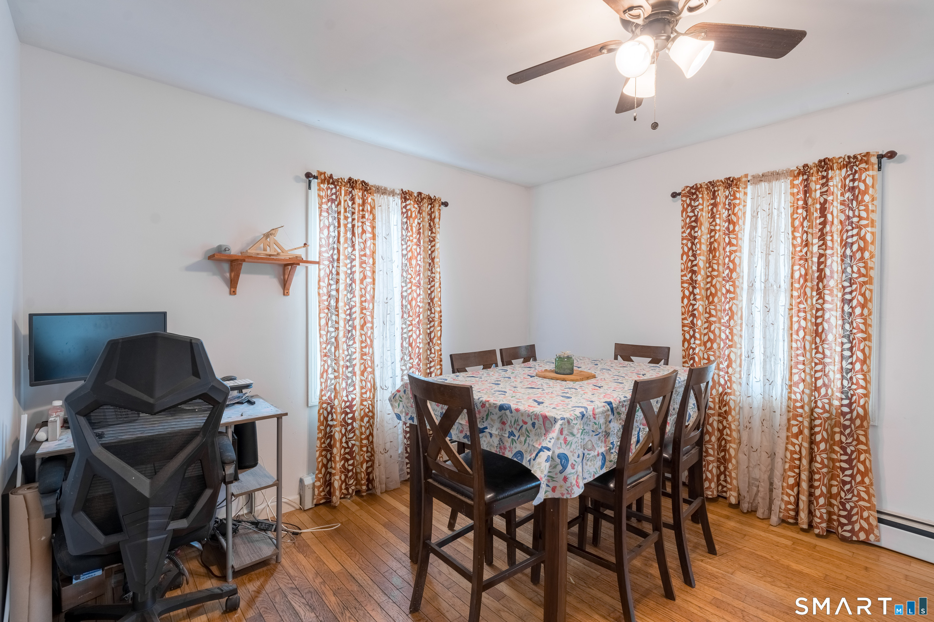 379 Christian Hill Road Brooklyn, CT 06234 - Photo 11 of 40 a view of a workspace with furniture and a window