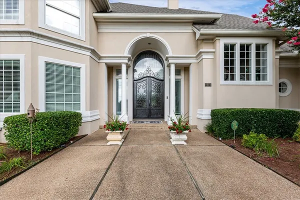 a view of house with swimming pool yard and outdoor seating