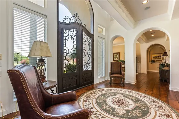 a living room with furniture fireplace and flat screen tv
