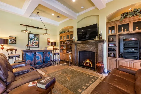 a kitchen with stainless steel appliances granite countertop a sink dishwasher stove top oven with cabinets and wooden floor