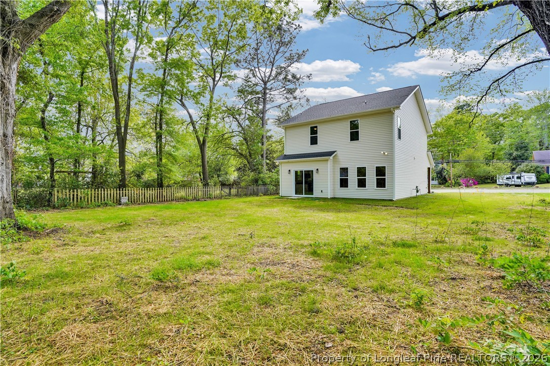 610 North Main Street Raeford, NC 28376 - Photo 26 of 28 a view of a house with a yard