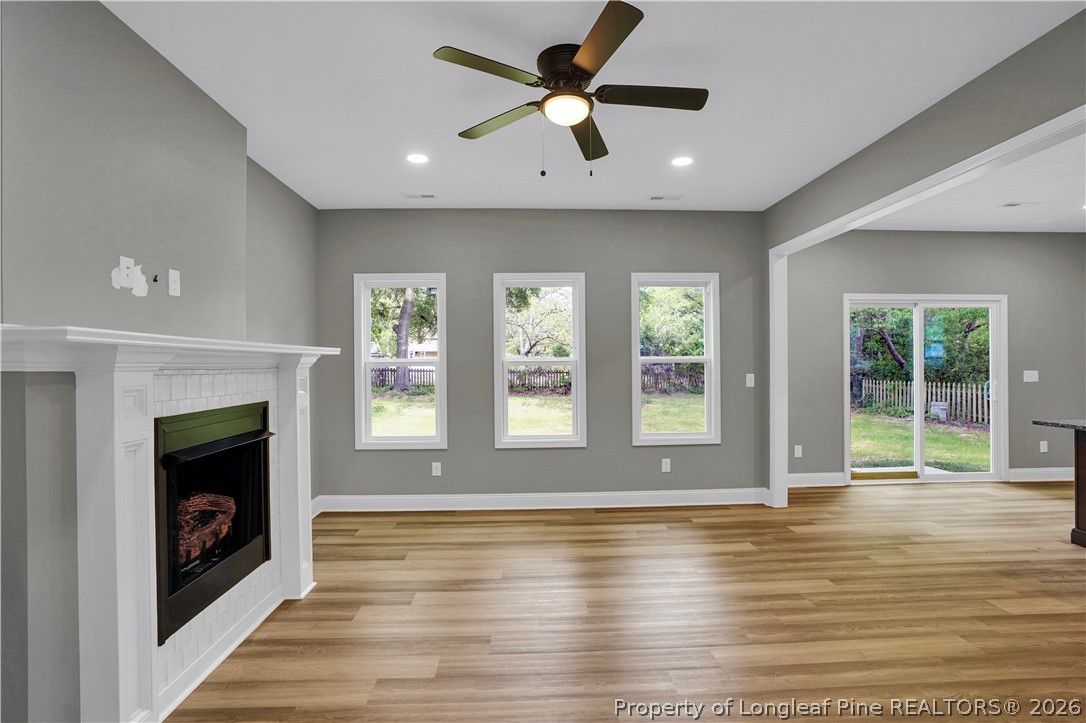610 North Main Street Raeford, NC 28376 - Photo 6 of 28 a view of an empty room with window and wooden floor