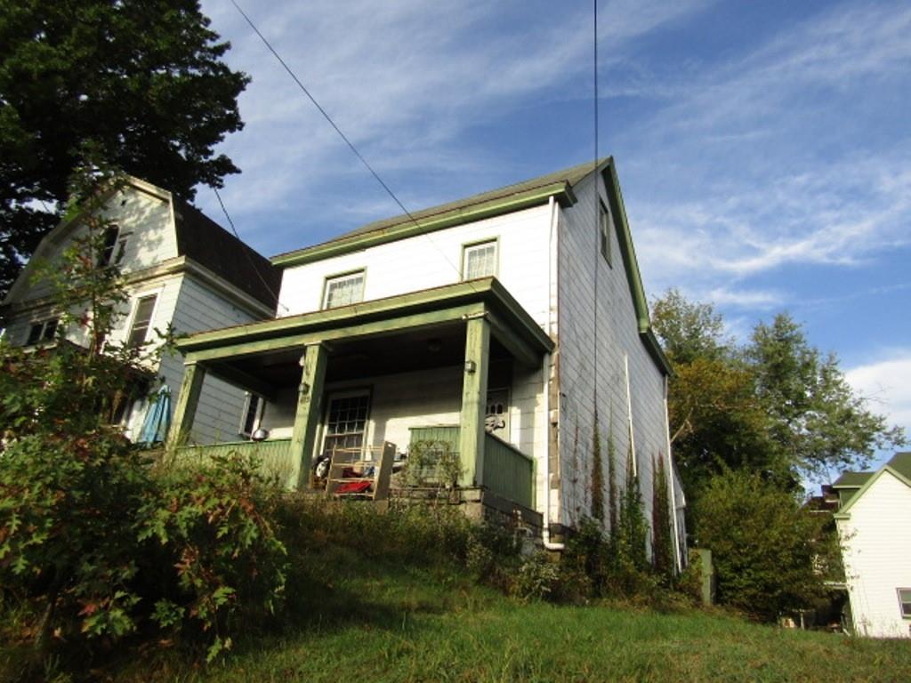 415 North School Street Pittsburgh, PA 15202 - Photo 3 of 4 a front view of a house with garden