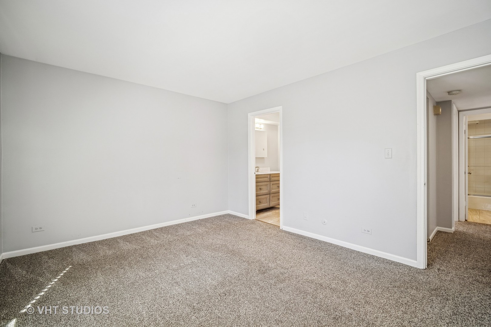 1499 Shermer Road, Unit 201E Northbrook, IL 60062 - Photo 11 of 16 a view of an empty room and entryway