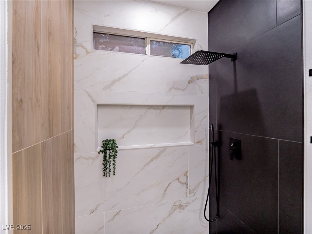 7870 Midnight Ride Street Las Vegas, NV 89131 - Photo 35 of 69 Full bathroom with a marble finish shower