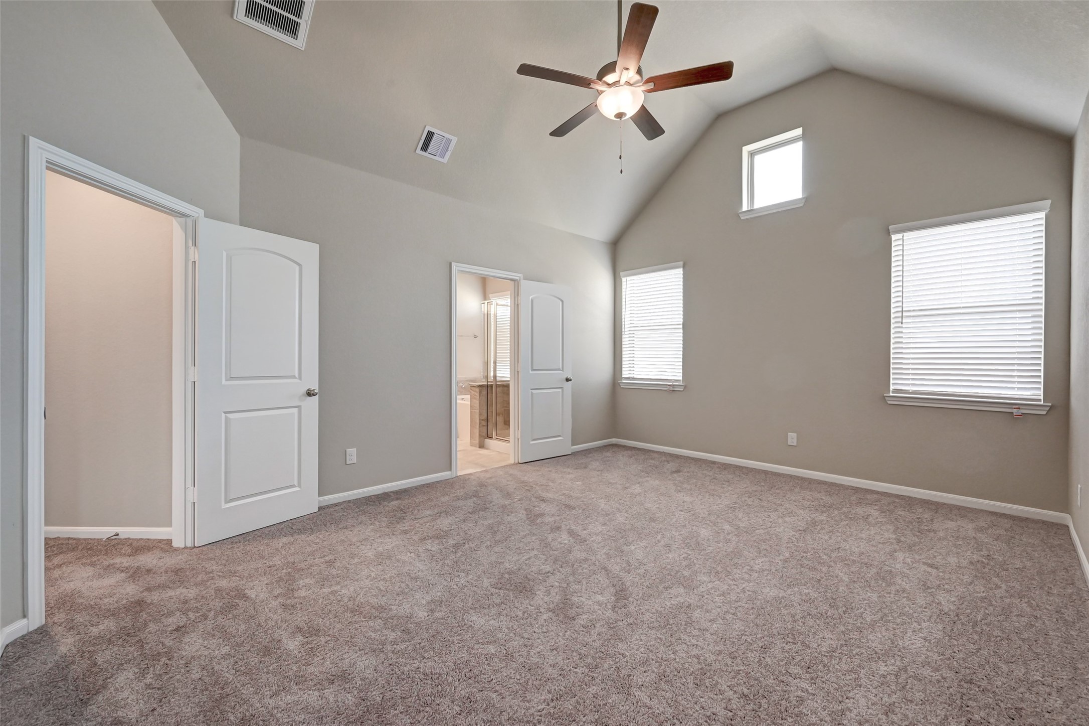 5039 Prairie Terrace Lane Fulshear, TX 77441 - Photo 9 of 16 Spacious Primary Suite with high ceiling & lots of natural light.