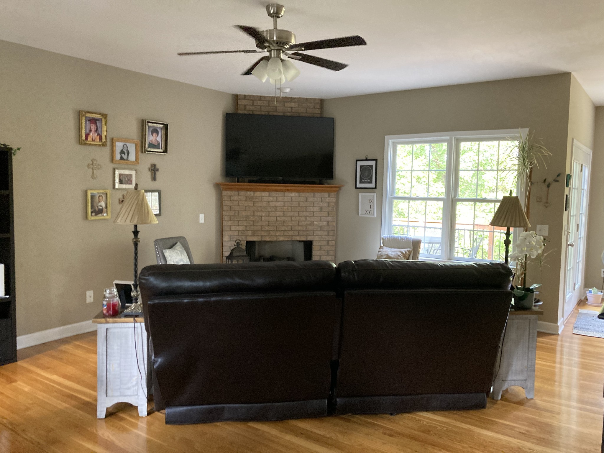 1225 Meeks Cemetery Road Burns, TN 37029 - Photo 13 of 66 a living room with furniture and a flat screen tv
