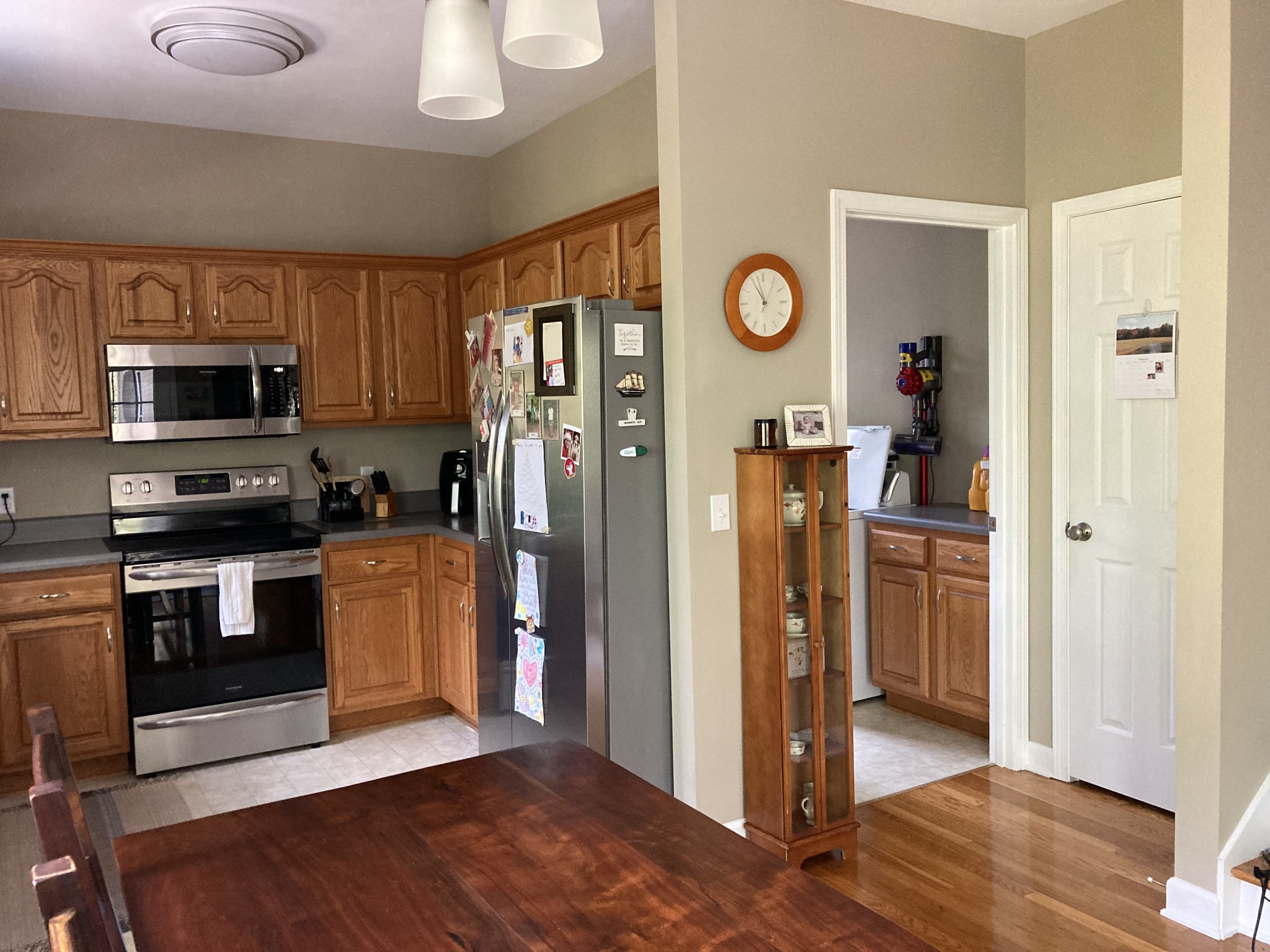 1225 Meeks Cemetery Road Burns, TN 37029 - Photo 23 of 66 a kitchen with stainless steel appliances granite countertop a refrigerator and a stove top oven