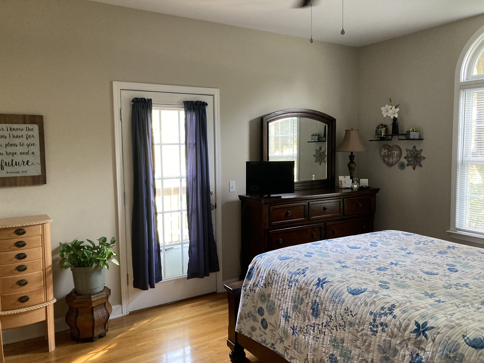 1225 Meeks Cemetery Road Burns, TN 37029 - Photo 30 of 66 a bedroom with a bed and a dresser