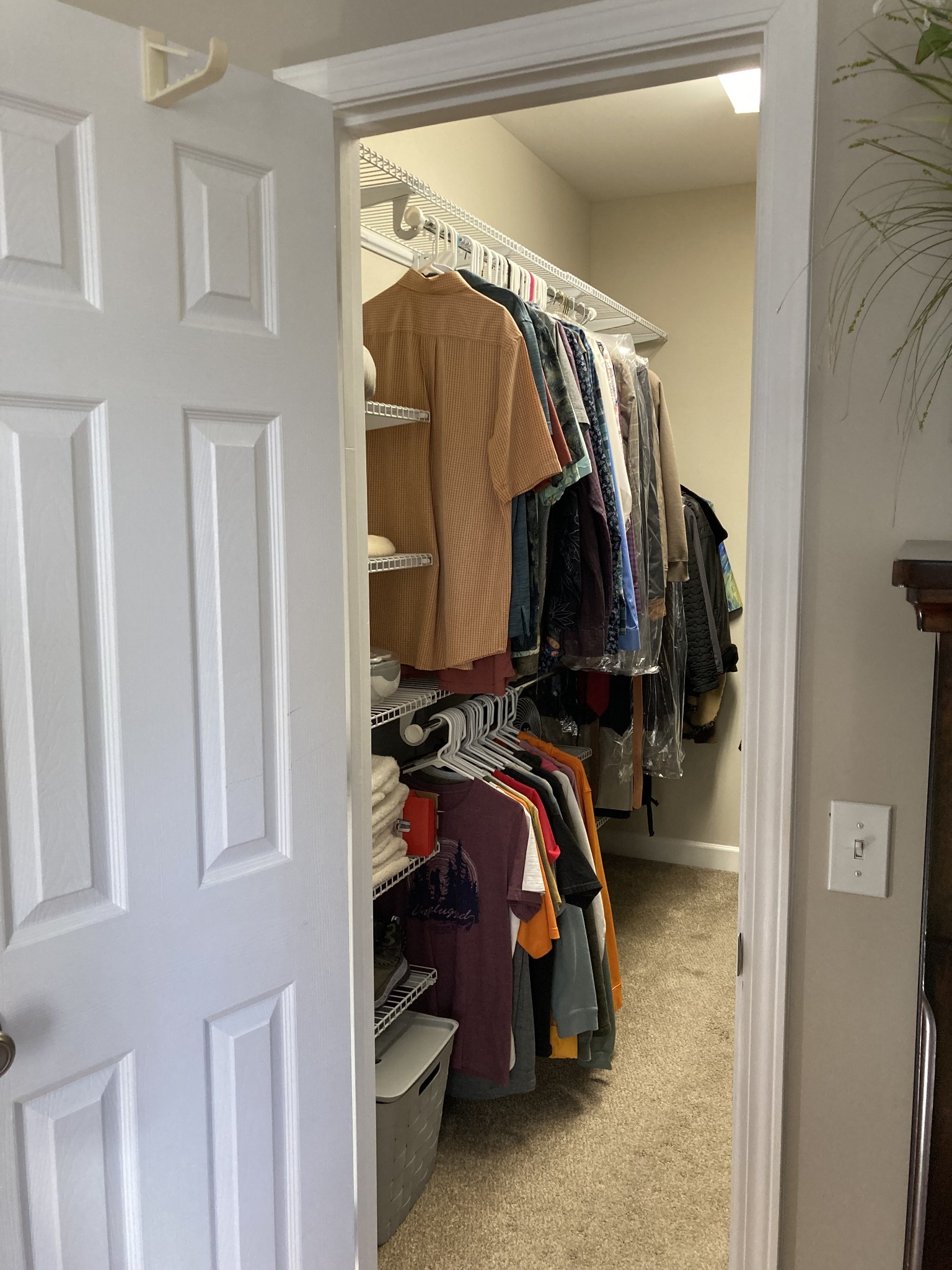 1225 Meeks Cemetery Road Burns, TN 37029 - Photo 32 of 66 a view of walk in closet with clothes and shoes