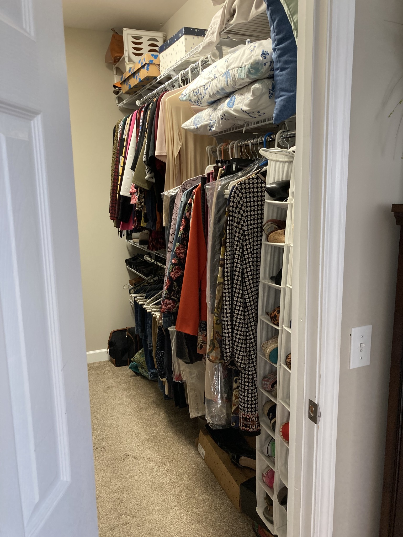 1225 Meeks Cemetery Road Burns, TN 37029 - Photo 33 of 66 a view of walk in closet with clothes and shoes