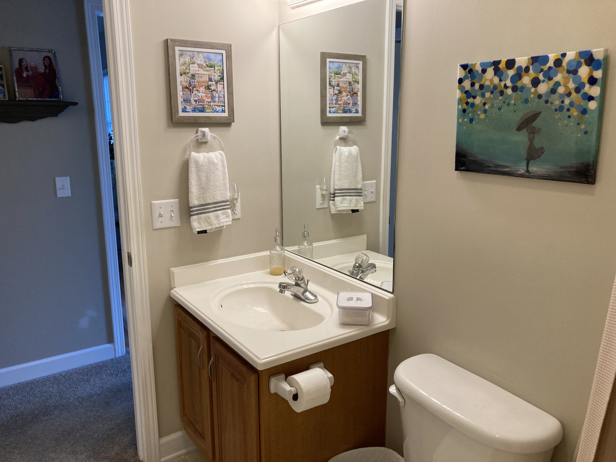 1225 Meeks Cemetery Road Burns, TN 37029 - Photo 43 of 66 a bathroom with a toilet sink and mirror