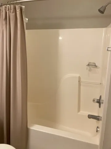 a view of a storage room with gym equipment