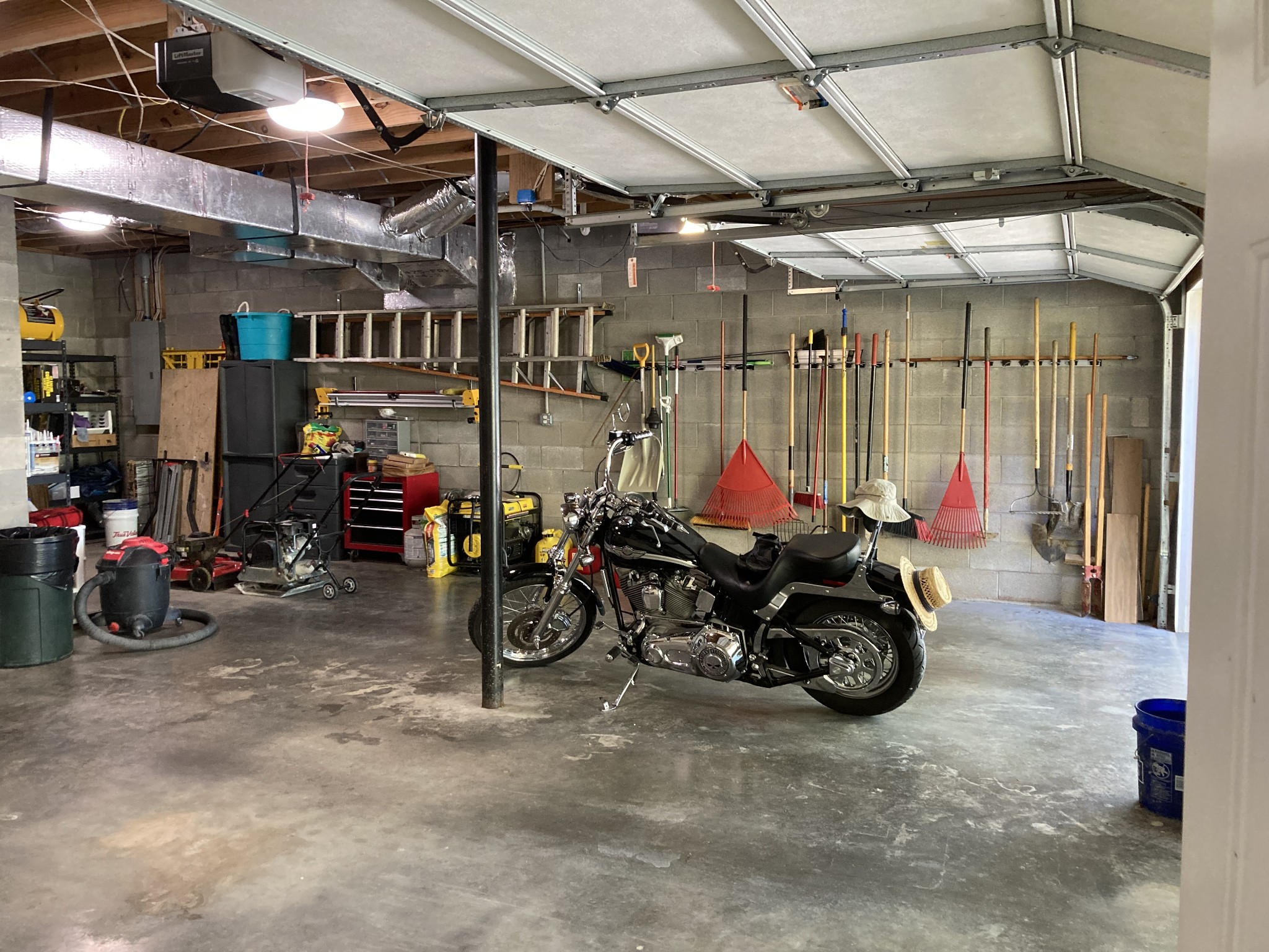 1225 Meeks Cemetery Road Burns, TN 37029 - Photo 56 of 66 a view of a storage room with gym equipment