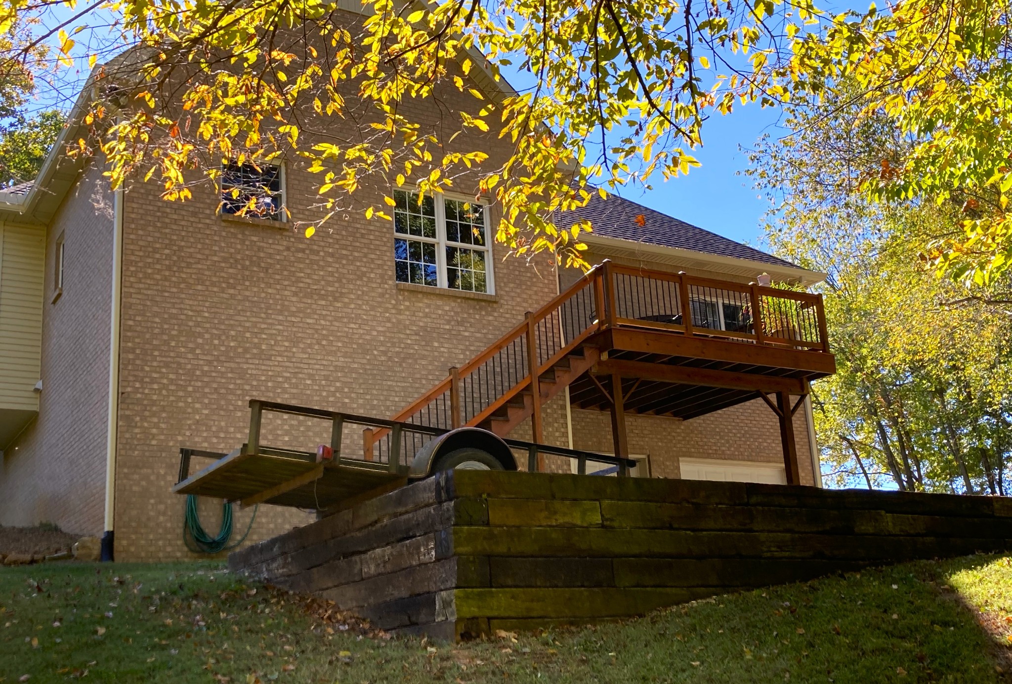1225 Meeks Cemetery Road Burns, TN 37029 - Photo 6 of 66 a view of house with trees in the background