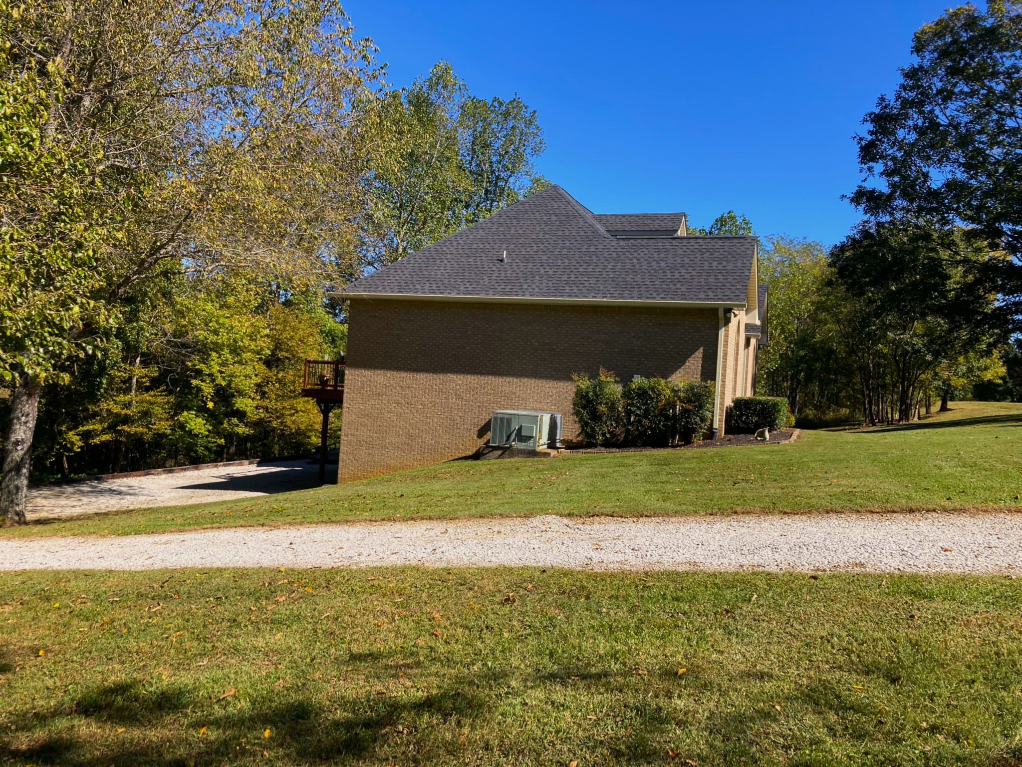 1225 Meeks Cemetery Road Burns, TN 37029 - Photo 9 of 66 a view of a house with a yard