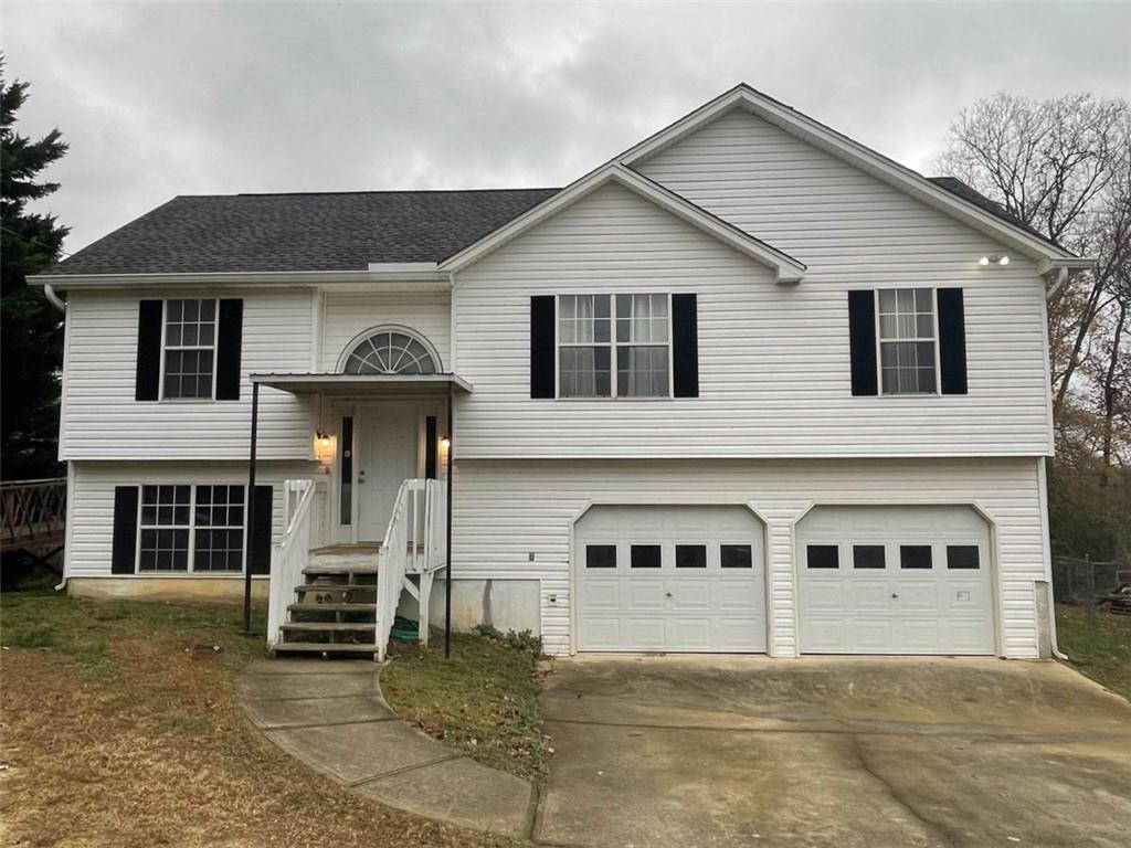 382 Pleasant Way Temple, GA 30179 - Photo 1 of 1 a front view of a house with a garage