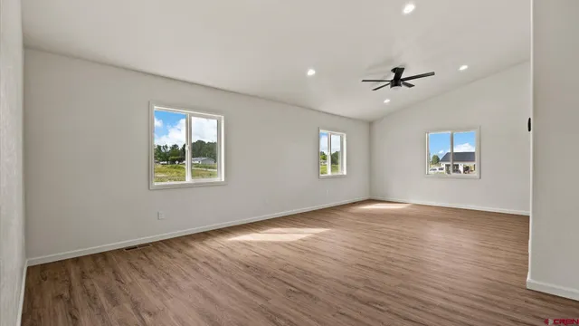a view of a kitchen with a sink and a stove top oven
