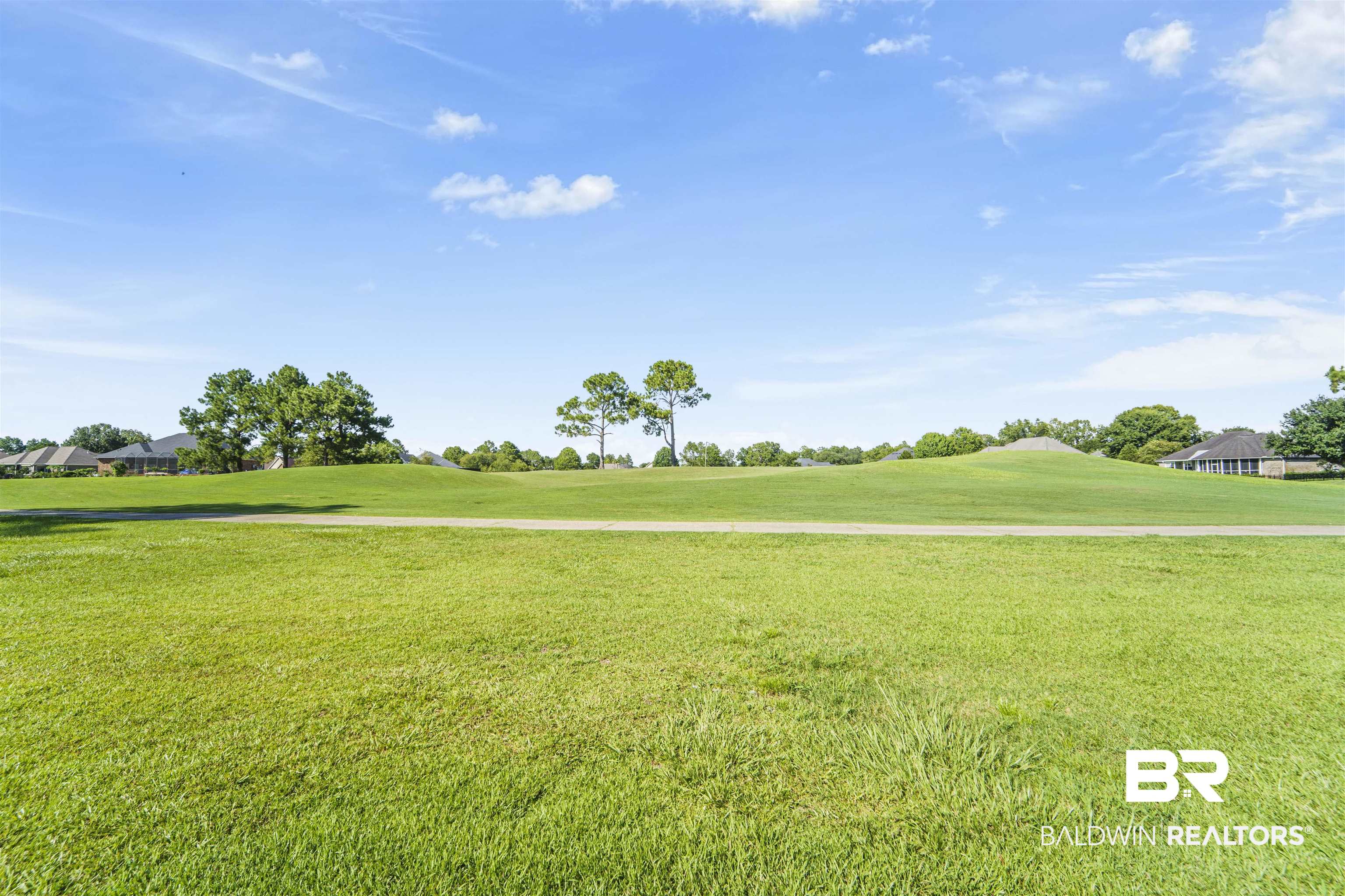 9505 Lakeview Drive Foley, AL 36535 - Photo 38 of 38 View of community with a yard and view of golf course