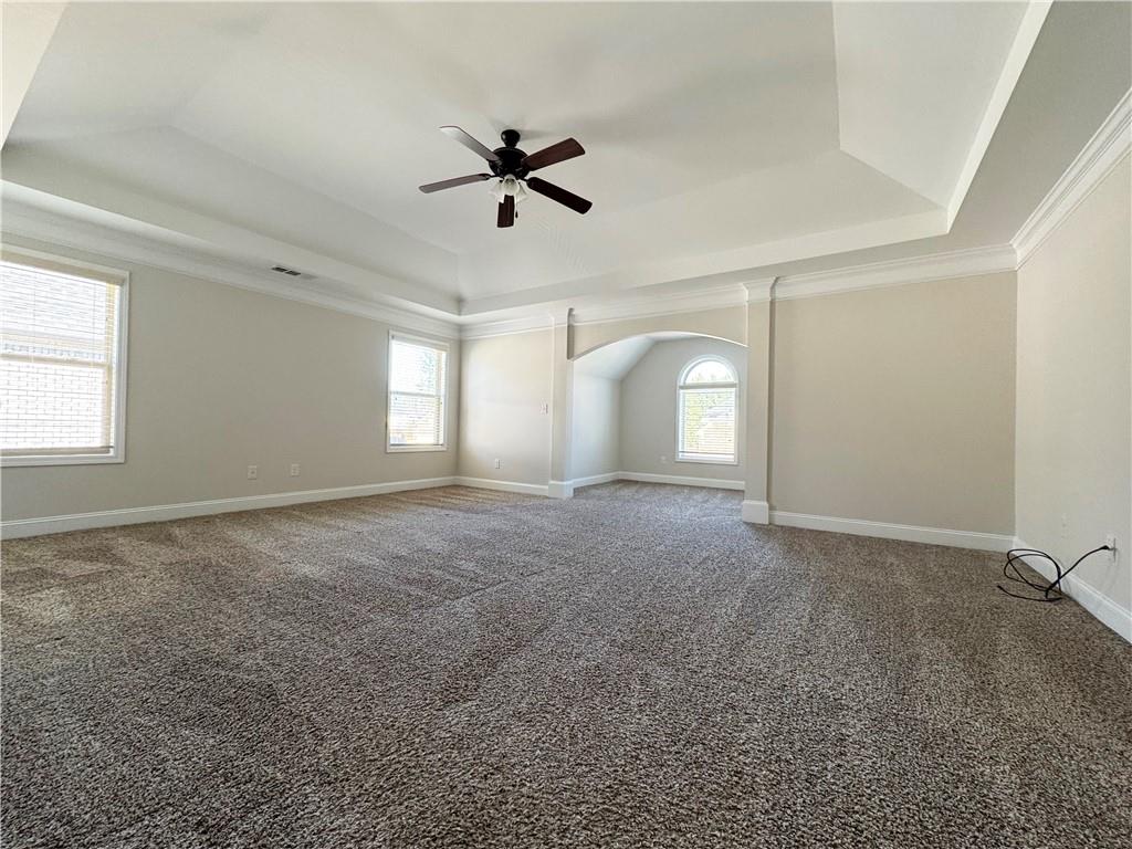 2251 Chance Lane Grayson, GA 30017 - Photo 17 of 35 a view of a livingroom with a ceiling fan and window