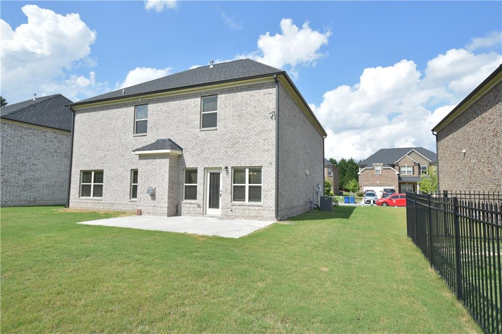 2251 Chance Lane Grayson, GA 30017 - Photo 35 of 35 a view of a house with backyard and porch
