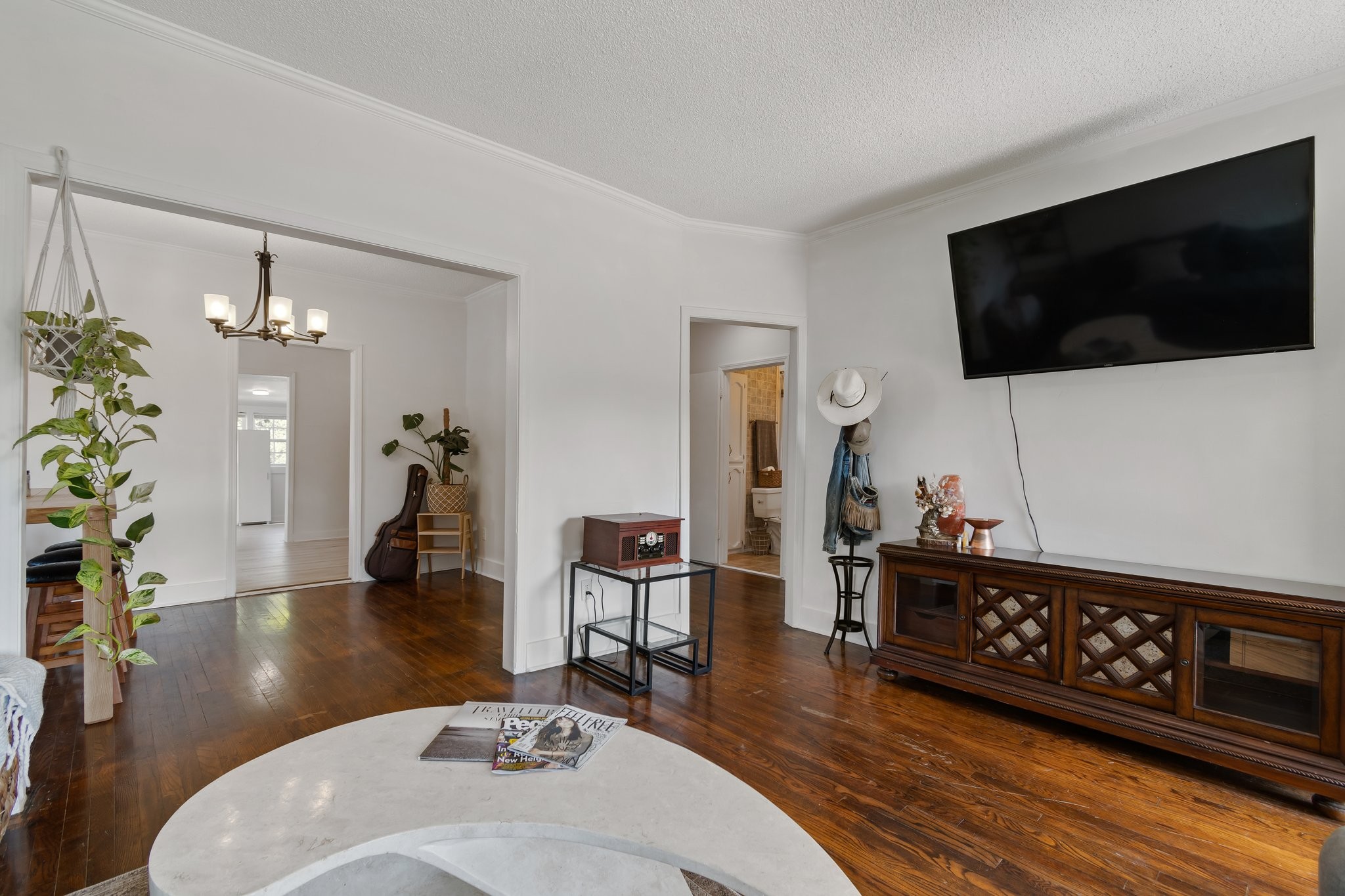 4711 Ollie Chunn Road Spring Hill, TN 37174 - Photo 11 of 64 a living room with furniture and a flat screen tv
